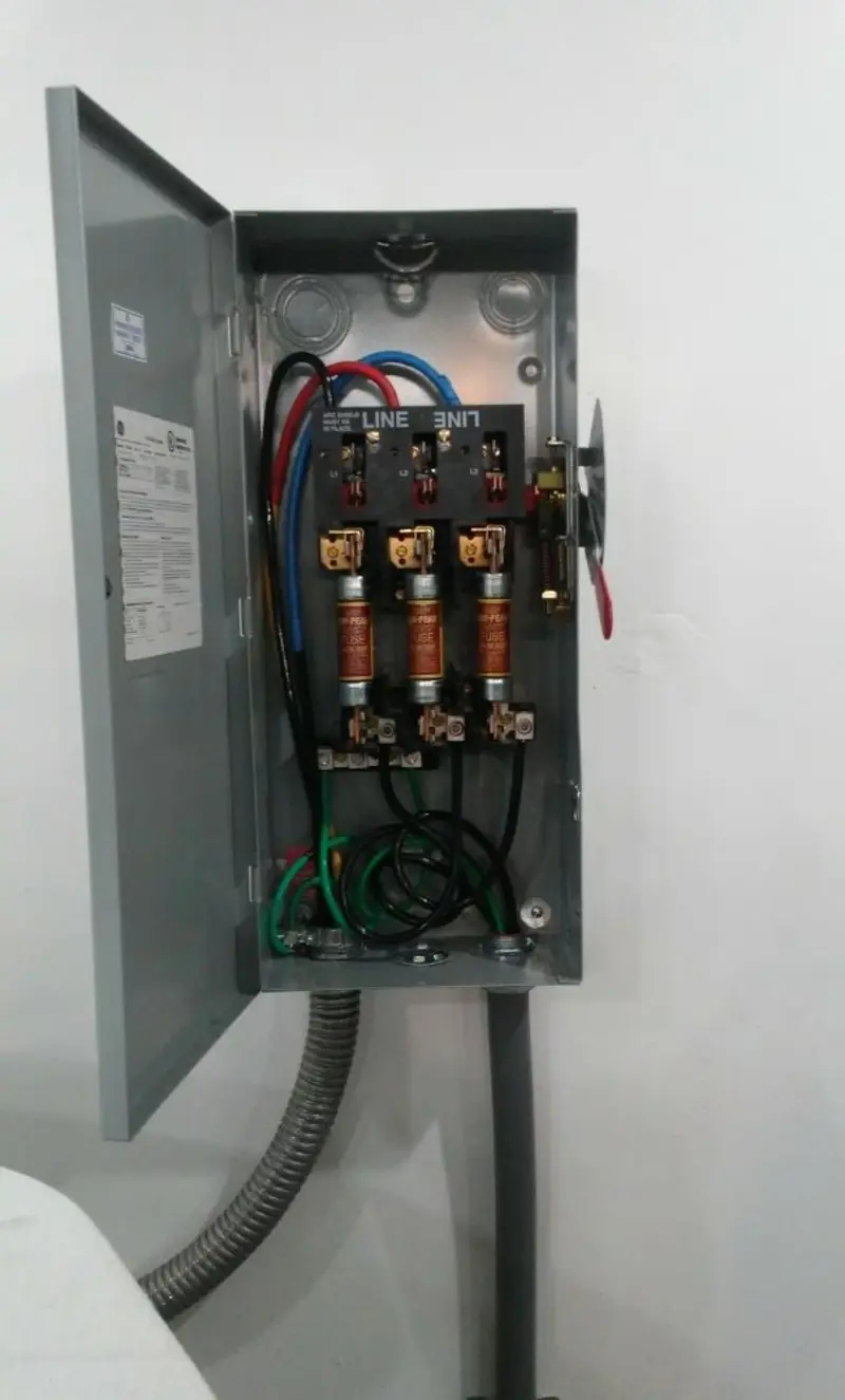 Three-phase disconnect switch installed for Smoke Detector Installation in Ball Ground